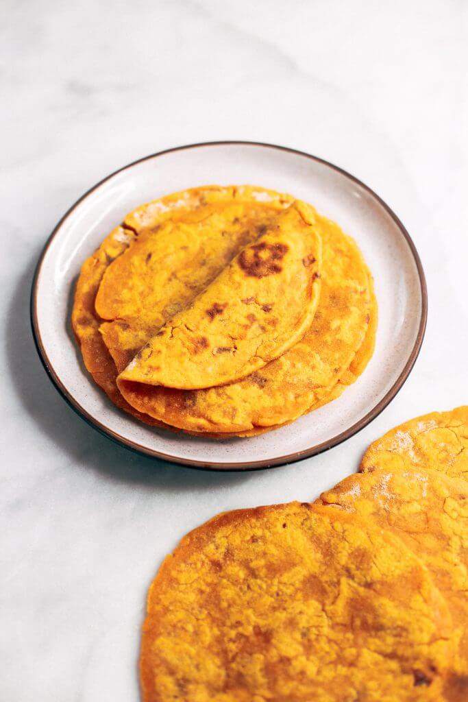 Two ingredient sweet potato paleo tortillas. An easy gluten free and paleo tortilla recipe. These tortillas are pliable, delicious, and easy to make!