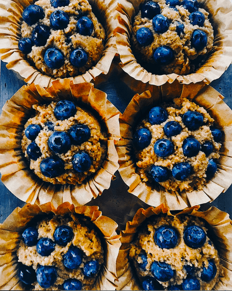 Paleo blueberry muffins made with sweet potatoes instead of flour! These flourless muffins make for a healthy breakfast on-the-go! Kid-proof and delicious paleo breakfast recipe for meal prep. #paleo #baking #recipes #glutenfree #helathy