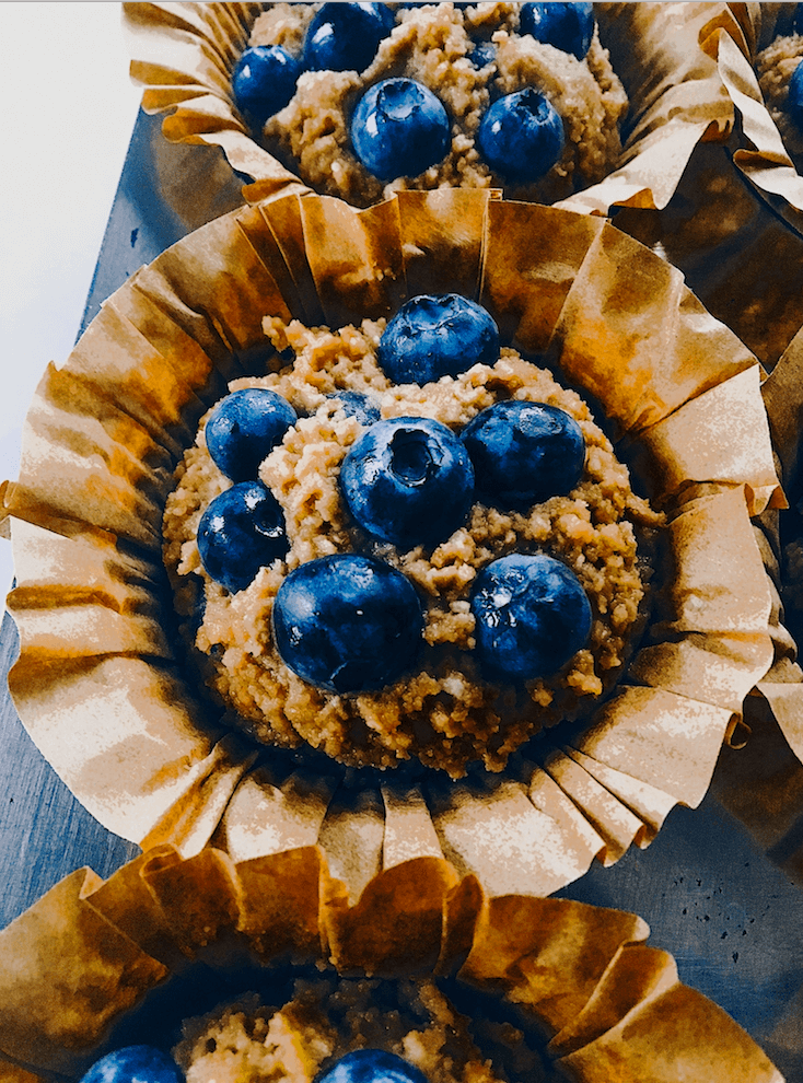 Paleo blueberry muffins made with sweet potatoes instead of flour! These flourless muffins make for a healthy breakfast on-the-go! Kid-proof and delicious paleo breakfast recipe for meal prep. #paleo #baking #recipes #glutenfree #helathy