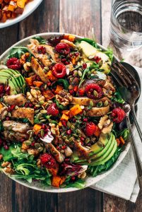 Whole30 harvest chicken salad with roasted rosemary sweet potatoes, avocado, nuts and berries, and homemade balsamic dressing. My favorite salad I eat on repeat! A healthy family dinner for paleo meal prep. #paleo #salad #whole30 #mealprep