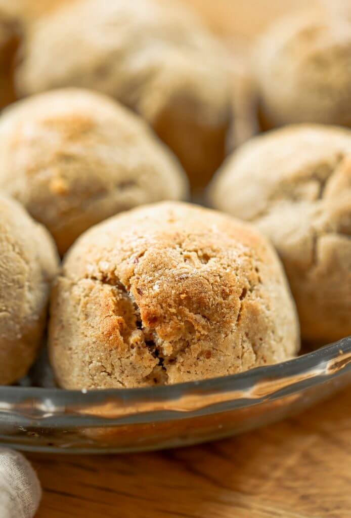 Homemade dinner rolls made with almond flour. These healthier paleo bread rolls are so easy to make and have no yeast! It's an easy gluten free bread recipe that the whole family will love. Perfect for serving with soup for dinner or with eggs for breakfast. #paleo #bread #baking #recipes #cooking