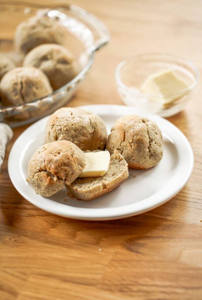 Homemade dinner rolls made with almond flour. These healthier paleo bread rolls are so easy to make and have no yeast! It's an easy gluten free bread recipe that the whole family will love. Perfect for serving with soup for dinner or with eggs for breakfast. #paleo #bread #baking #recipes #cooking