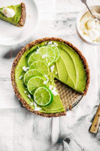 Delicious key lime pie! This vegan key lime pie recipe is made with avocados and will slay the dessert table- even the non-vegans in my life love this recipe! Healthy paleo and raw key lime pie recipe. #vegan #paleo #avocados #recipes #baking #pie