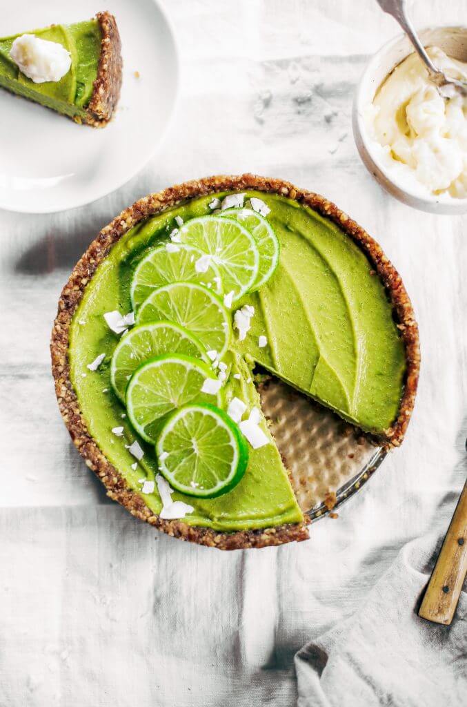 Delicious key lime pie! This vegan key lime pie recipe is made with avocados and will slay the dessert table- even the non-vegans in my life love this recipe! Healthy paleo and raw key lime pie recipe. #vegan #paleo #avocados #recipes #baking #pie