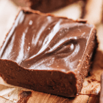 109 calorie easy homemade fudge recipe, made with just two ingredients! Melt in your mouth paleo fudge recipe anyone can make at home in their kitchen. Perfect freezer-friendly healthier candy option to have on hand. #paleo #candy #cooking #chocolate #vegan