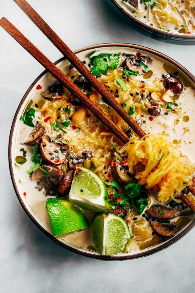 Whole30 and vegan spicy peanut ramen! Fast and easy spaghetti squash noodles with spicy peanut lime broth. A healthy vegetarian ramen recipe for the whole family. Spaghetti squash paleo ramen recipe. #paleo #recipe #cooking #whole30 #vegan