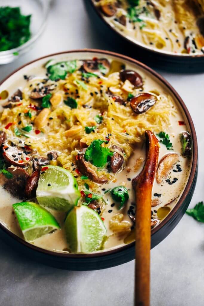 Whole30 and vegan spicy peanut ramen! Fast and easy spaghetti squash noodles with spicy peanut lime broth. A healthy vegetarian ramen recipe for the whole family. Spaghetti squash paleo ramen recipe. #paleo #recipe #cooking #whole30 #vegan