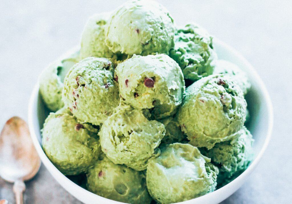 Mint chocolate chip ice-cream made with avocados! Dairy free and delicious ice-cream recipe that you DON'T even need an ice-cream maker to make this recipe! Love this paleo and vegan recipe for mint chocolate chip ice-cream. #paleo #ice-cream #recipes #cooking #vegan #desserts