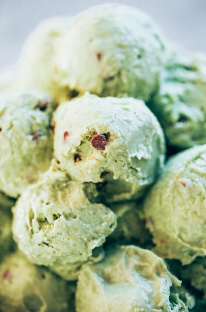 Mint chocolate chip ice-cream made with avocados! Dairy free and delicious ice-cream recipe that you DON'T even need an ice-cream maker to make this recipe! Love this paleo and vegan recipe for mint chocolate chip ice-cream. #paleo #ice-cream #recipes #cooking #vegan #desserts