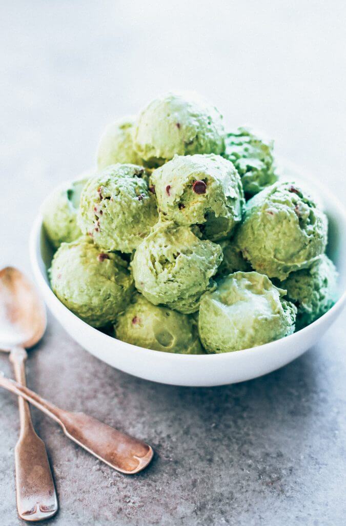 Mint chocolate chip ice-cream made with avocados! Dairy free and delicious ice-cream recipe that you DON'T even need an ice-cream maker to make this recipe! Love this paleo and vegan recipe for mint chocolate chip ice-cream. #paleo #ice-cream #recipes #cooking #vegan #desserts