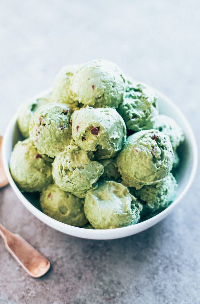 Mint chocolate chip ice-cream made with avocados! Dairy free and delicious ice-cream recipe that you DON'T even need an ice-cream maker to make this recipe! Love this paleo and vegan recipe for mint chocolate chip ice-cream. #paleo #ice-cream #recipes #cooking #vegan #desserts