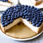Blueberry creamy pie made with dairy-free coconut cream filling and homemade paleo coconut flour crust. Fresh and easy summer dessert topped with plenty of fresh blueberries! An easy paleo blueberry cream pie recipe. #pie #baking #recipes #paleo #cooking #dessert
