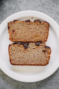 How to make coconut flour banana bread. An easy paleo banana bread recipe, naturally sweetened with dates. This gluten free loaf is made in just minutes in a food processor! Make this easy breakfast bread the whole family will love. #paleo #recipes #glutenfree #fruit #baking #cooking