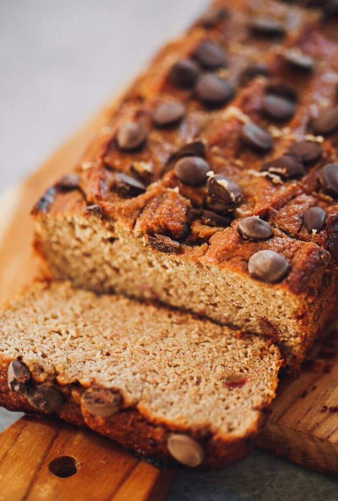 How to make coconut flour banana bread. An easy paleo banana bread recipe, naturally sweetened with dates. This gluten free loaf is made in just minutes in a food processor! Make this easy breakfast bread the whole family will love. #paleo #recipes #glutenfree #fruit #baking #cooking