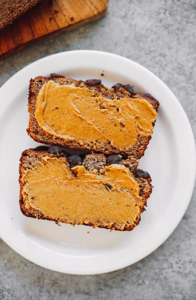 How to make coconut flour banana bread. An easy paleo banana bread recipe, naturally sweetened with dates. This gluten free loaf is made in just minutes in a food processor! Make this easy breakfast bread the whole family will love. #paleo #recipes #glutenfree #fruit #baking #cooking