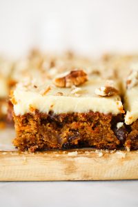 Paleo carrot cake made with sweet potatoes instead of flour. 159 calorie gluten free carrot cake. This cake is so delicious you won't even know it's healthy! Whipped lemon frosting is also made from sweet potatoes! #paleo #baking #cake #recipes #dessert