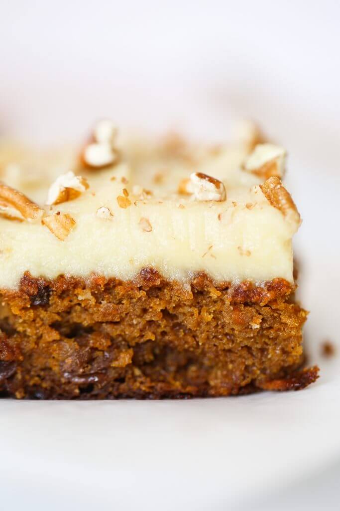 Paleo carrot cake made with sweet potatoes instead of flour. 159 calorie gluten free carrot cake. This cake is so delicious you won't even know it's healthy! Whipped lemon frosting is also made from sweet potatoes! #paleo #baking #cake #recipes #dessert