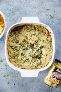 Creamy vegan artichoke dip made with cashews instead of dairy. A healthy snack and dip for veggie sticks, crackers, or bread. This paleo artichoke dip recipe is so easy to make and will keep you full and satisfied. #paleo #vegan #cooking #recipes #healthy #dairyfree