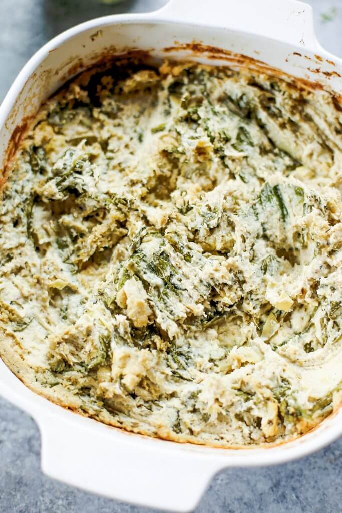 Creamy vegan artichoke dip made with cashews instead of dairy. A healthy snack and dip for veggie sticks, crackers, or bread. This paleo artichoke dip recipe is so easy to make and will keep you full and satisfied. #paleo #vegan #cooking #recipes #healthy #dairyfree