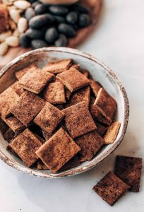 Pumpkin fall spice crackers made with sweet potatoes instead of flour! These grain free and paleo crackers are full of autumn flavors, nice and crunchy, and are perfect paired with a side of vanilla yogurt dip or served on a cheese board.