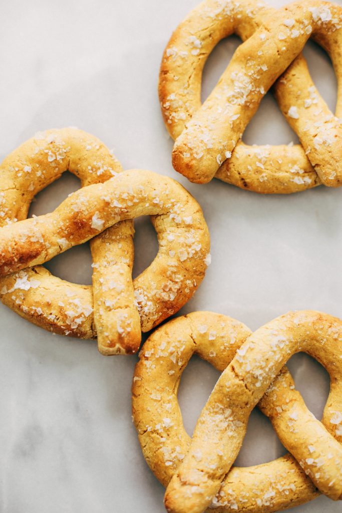 Paleo pretzels made with sweet potato! These gluten-free pretzels are easy to make and they are soft and chewy, like a real soft-baked pretzel. Can't stop eating them!