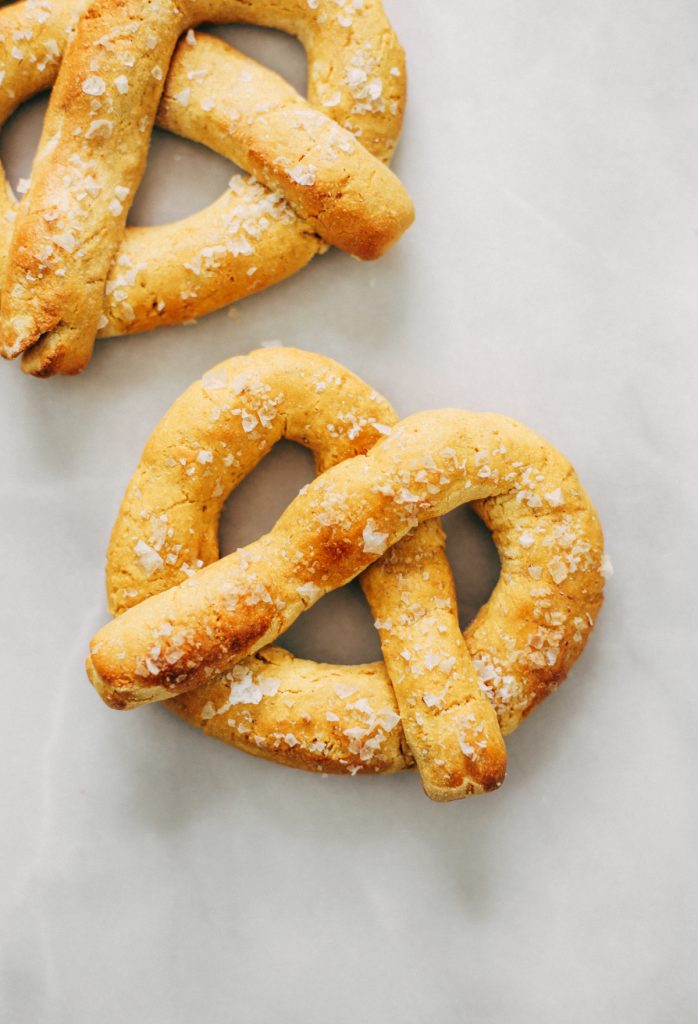 Paleo pretzels made with sweet potato! These gluten-free pretzels are easy to make and they are soft and chewy, like a real soft-baked pretzel. Can't stop eating them!