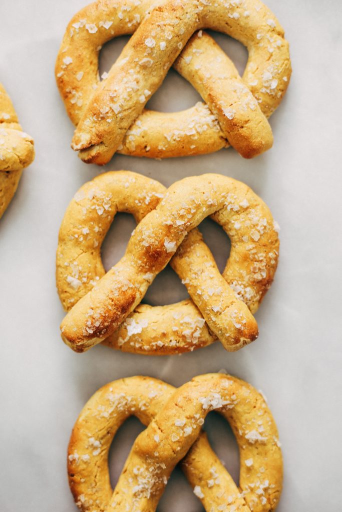 Paleo pretzels made with sweet potato! These gluten-free pretzels are easy to make and they are soft and chewy, like a real soft-baked pretzel. Can't stop eating them!