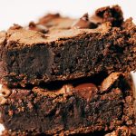 Low calorie protein brownies made without any flour and 9g protein! They are rich and chocolatey, but still super healthy and easy to make! These gluten free brownies are naturally sweetened without any refined sugar. They are made from chickpeas, protein powder, cocoa powder, maple syrup, and almond butter- super easy and way more delicious than you might think!